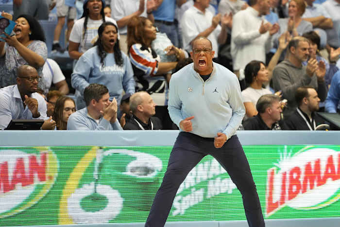 UNC basketball head coach Hubert Davis versus Duke